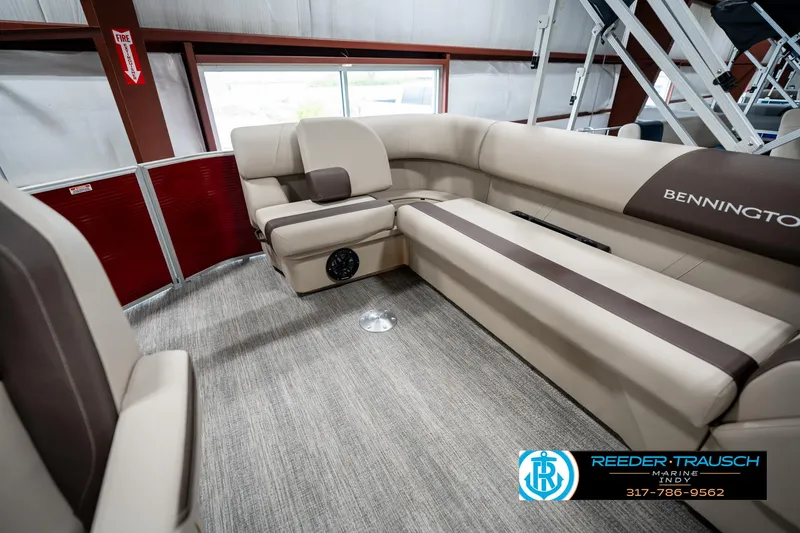 Slide: The Image of Luxurious interior of 2025 Bennington 21 SLS pontoon boat with plush seating. - 24