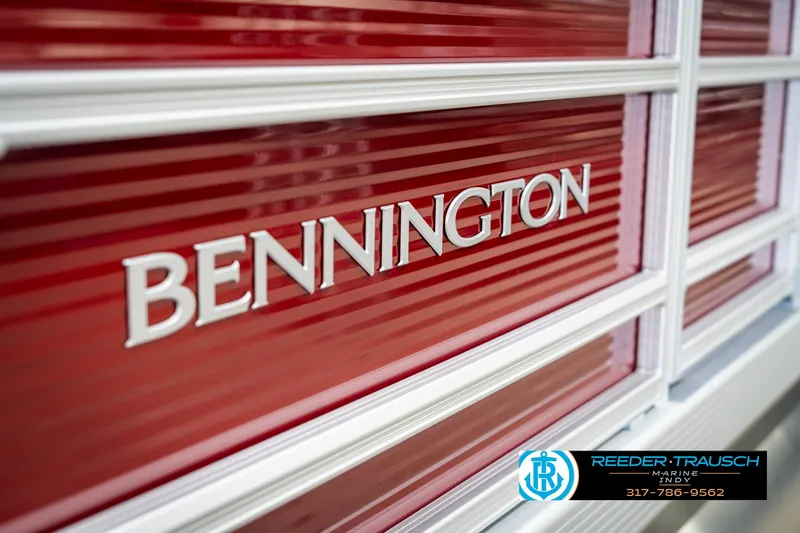 Slide: The Image of 2025 Bennington 21 SLS boat with red exterior and branding. - 44