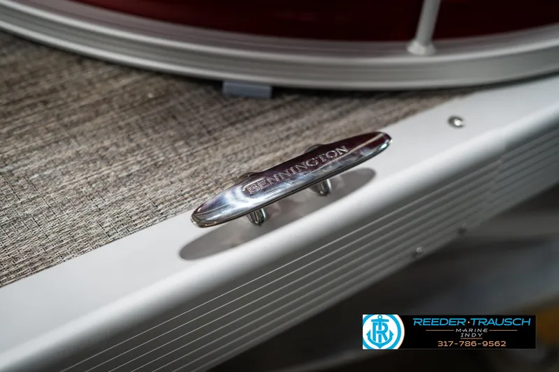 Slide: The Image of 2025 Bennington 21 SLS boat cleat detail with Reeder-Trausch Marine logo. - 47