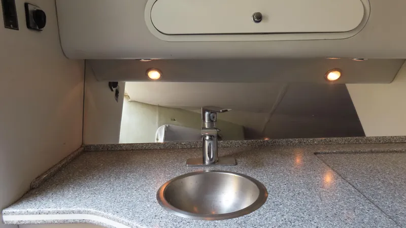 Slide: The Image of 2001 Outerlimits 42 Legacy boat interior with sleek countertop and modern sink design. - 22