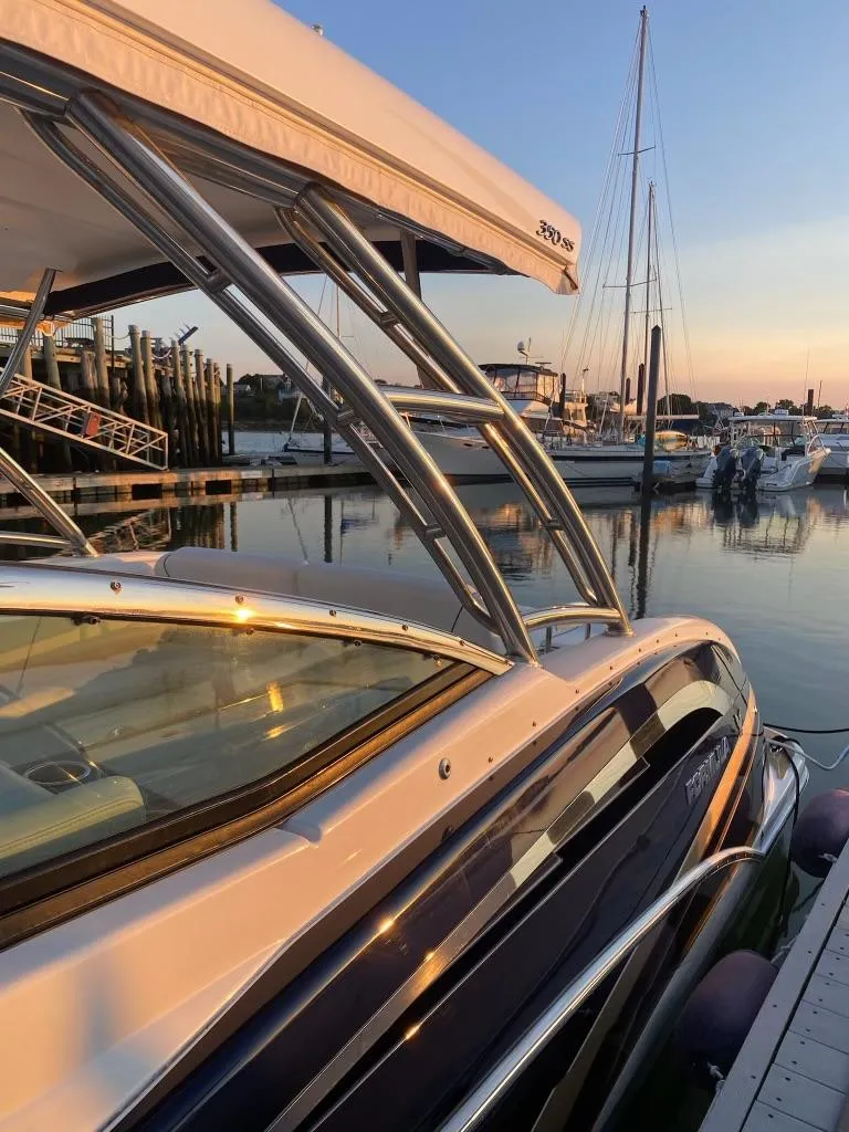 Slide: The Image of 2016 Formula 350 Sun Sport docked at sunset in a marina. - 12