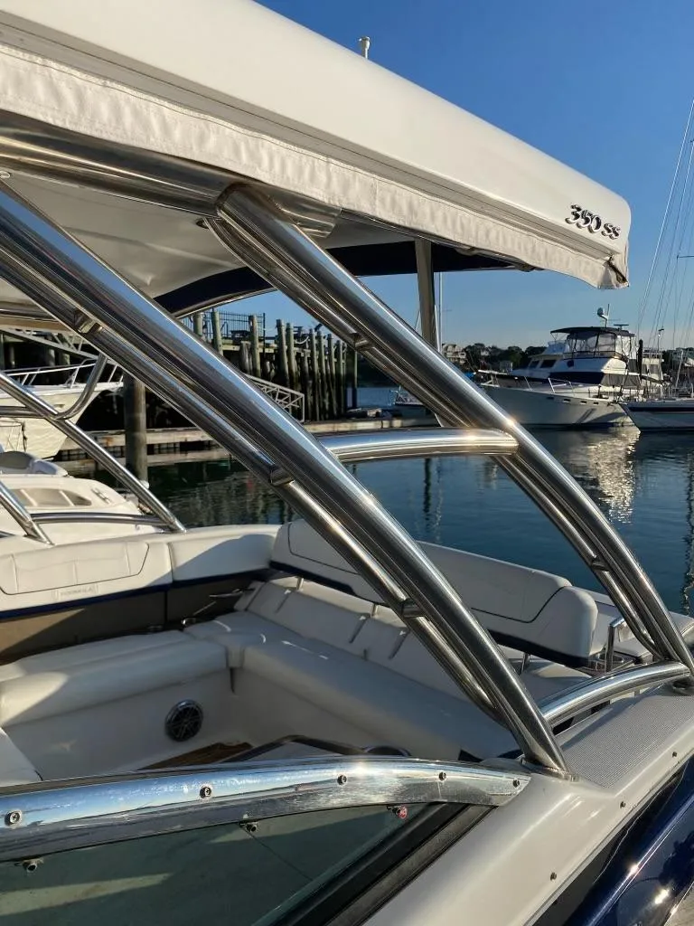 Slide: The Image of 2016 Formula 350 Sun Sport boat docked at marina, sunny day. - 13