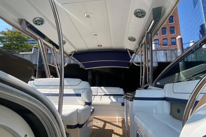 Slide: The Image of 2016 Formula 350 Sun Sport boat interior with white seating and sleek design. - 34