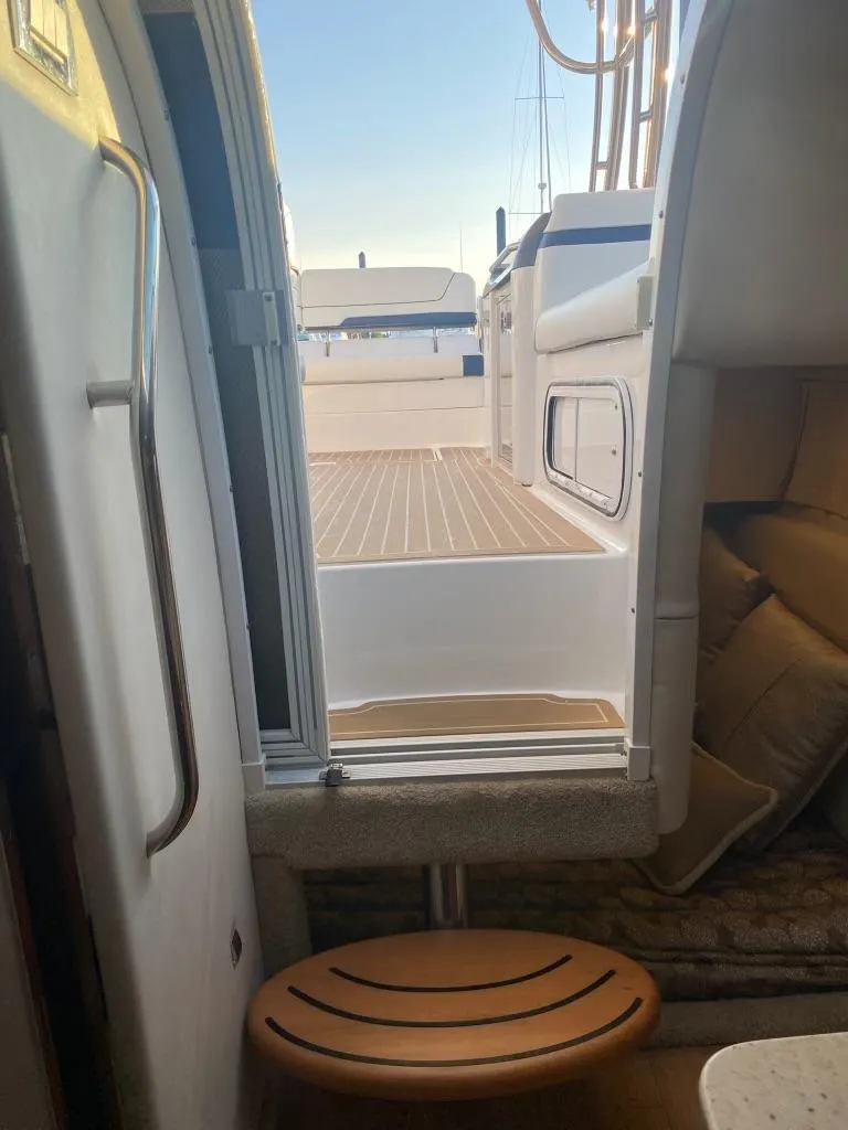 Slide: The Image of Interior view of 2016 Formula 350 Sun Sport boat, showing cabin and deck access. - 35