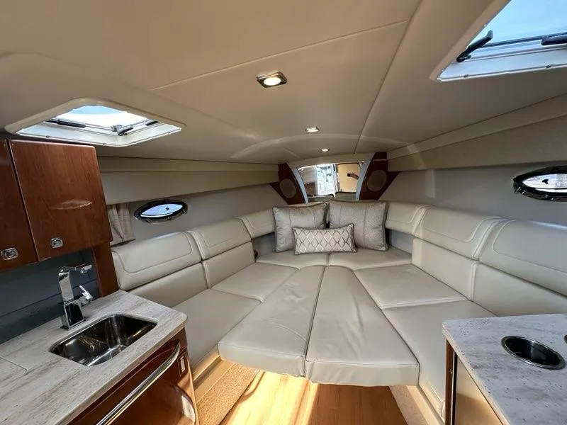 Slide: The Image of Luxurious interior of 2016 Formula 350 Sun Sport yacht with plush seating and kitchenette. - 40