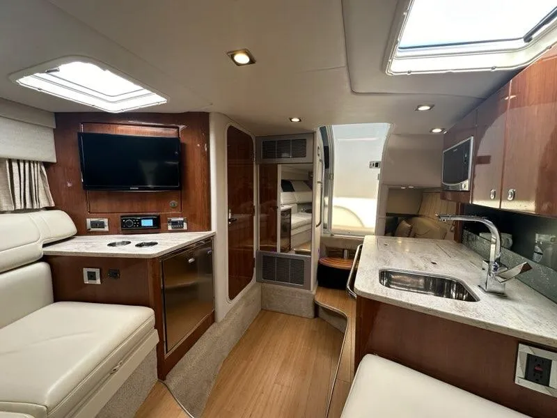 Slide: The Image of Luxurious interior of 2016 Formula 350 Sun Sport yacht with modern amenities and wood finishes. - 42