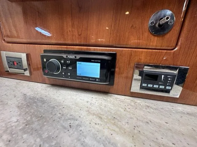 Slide: The Image of Control panel of 2016 Formula 350 Sun Sport with audio system and switches. - 44