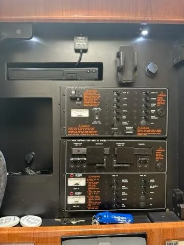 Slide: The Image of Control panel of a 2016 Formula 350 Sun Sport boat with various switches and indicators. - 45