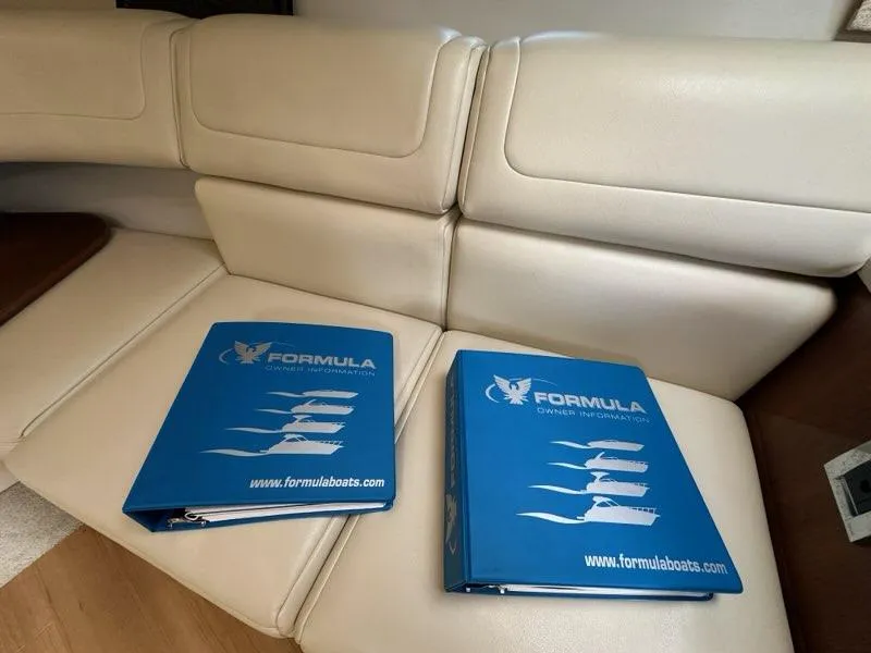 Slide: The Image of Two blue Formula binders on beige boat seating, 2016 Formula 350 Sun Sport. - 46