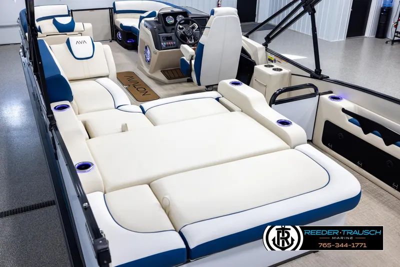 Slide: The Image of Luxurious interior of 2025 Avalon Catalina VRB pontoon boat with plush seating and modern dashboard. - 11