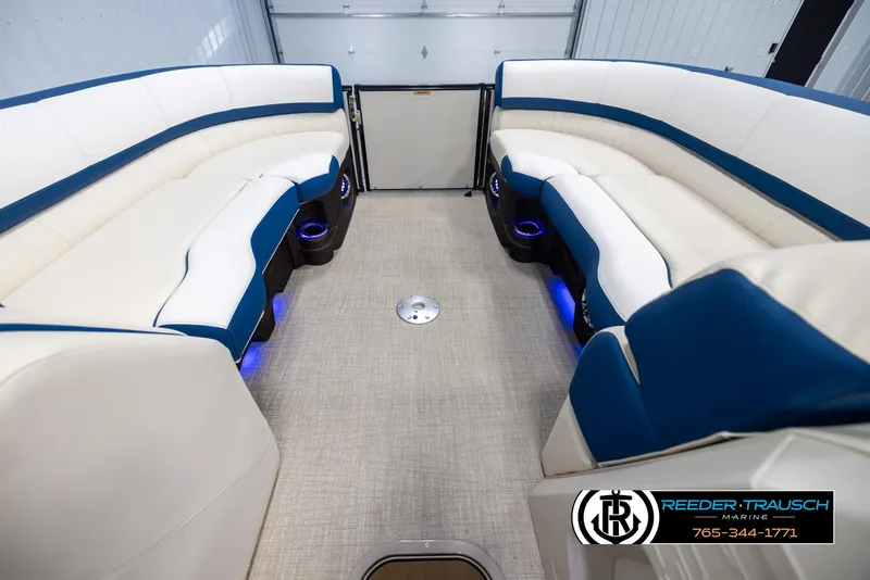 Slide: The Image of Luxurious interior of 2025 Avalon Catalina VRB pontoon boat with plush seating and ambient lighting. - 18