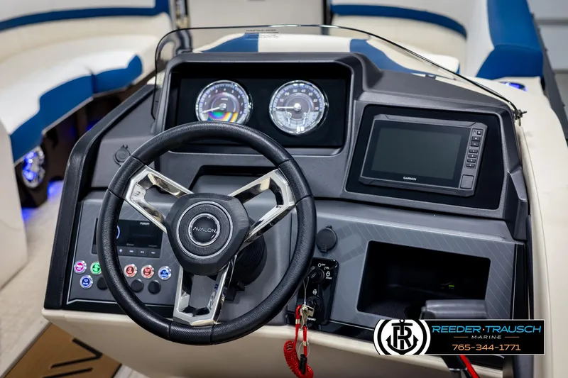 Slide: The Image of Steering console of 2025 Avalon Catalina VRB boat with modern controls and Garmin display. - 27