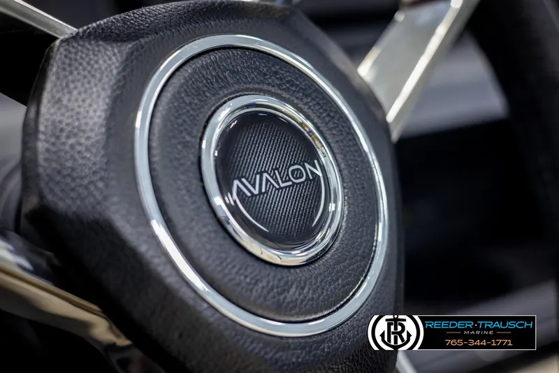 Slide: The Image of Steering wheel of 2025 Avalon Catalina VRB with logo detail. - 29