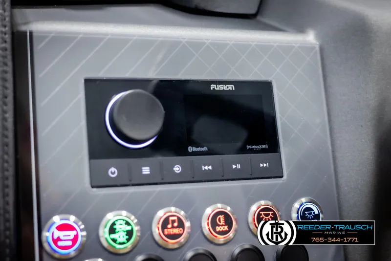 Slide: The Image of 2025 Avalon Catalina VRB control panel with Fusion audio system and illuminated buttons. - 31