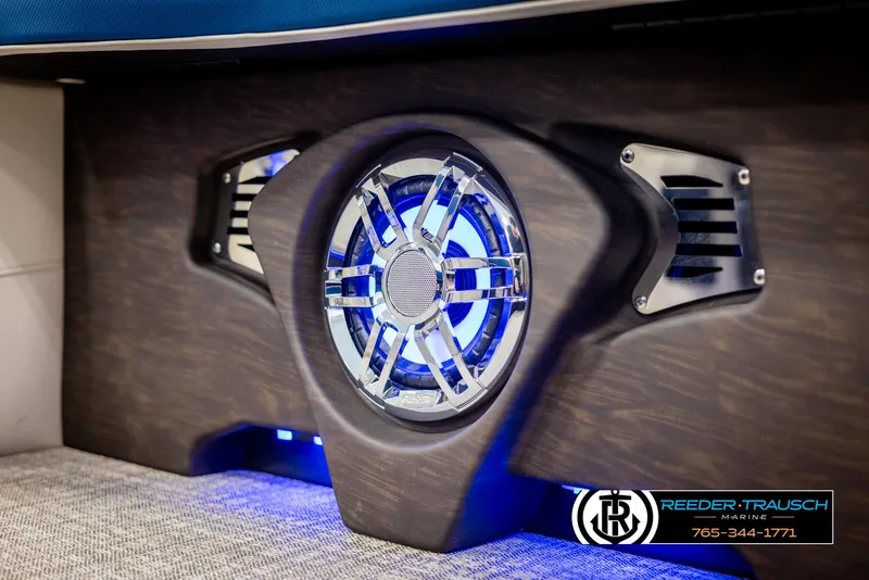 Slide: The Image of 2025 Avalon Catalina VRB speaker with blue LED lighting, Reeder-Trausch Marine branding. - 38