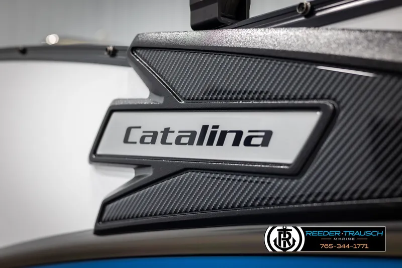 Slide: The Image of 2025 Avalon Catalina VRB boat logo with carbon fiber detail, Reeder-Trausch Marine branding. - 45