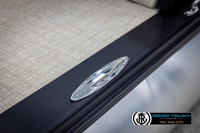 Slide: The Image of 2025 Avalon Catalina VRB boat detail with sleek chrome handle and textured flooring. - 47