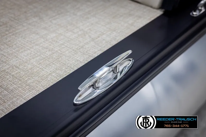 Slide: The Image of 2025 Avalon Catalina VRB boat cleat detail with textured surface and Reeder-Trausch Marine logo. - 48