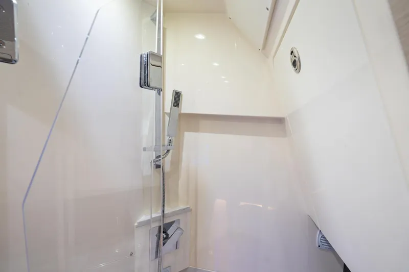 Slide: The Image of 2023 Scout 425 LXF yacht interior shower with modern fixtures and sleek design. - 40
