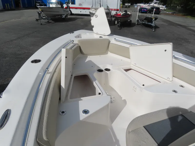 Slide: The Image of 2025 Key West 219 FS boat interior with open storage compartments. - 15