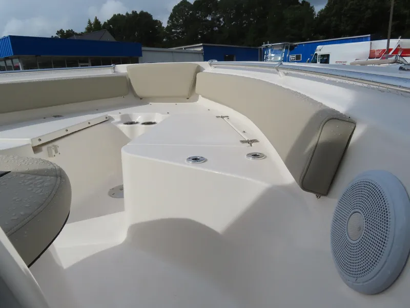 Slide: The Image of 2025 Key West 219 FS boat interior with seating and speaker. - 18