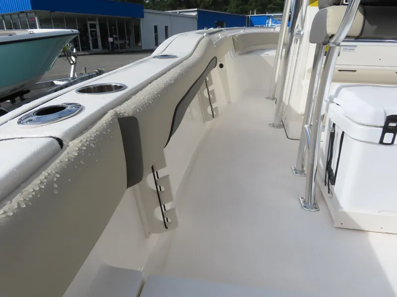 Slide: The Image of 2025 Key West 219 FS boat interior with cup holders and seating. - 20