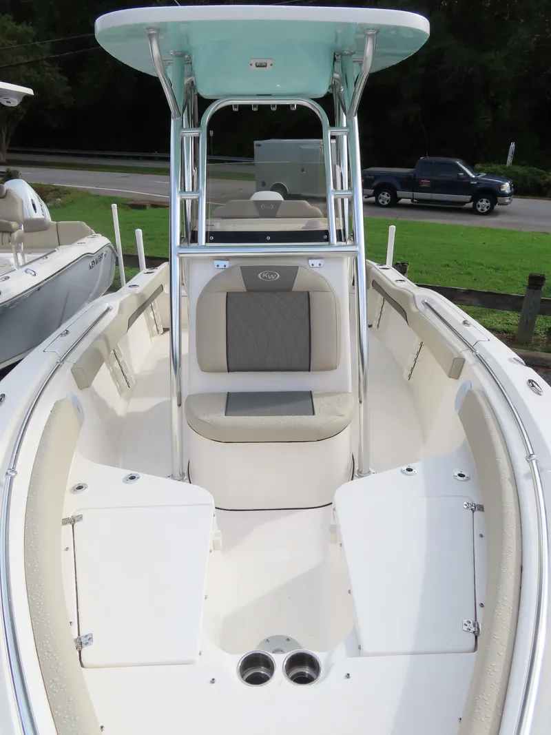 Slide: The Image of 2025 Key West 219 FS boat interior with seating and storage compartments. - 28