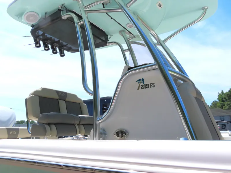 Slide: The Image of 2025 Key West 219 FS boat with sleek seating and modern design. - 4