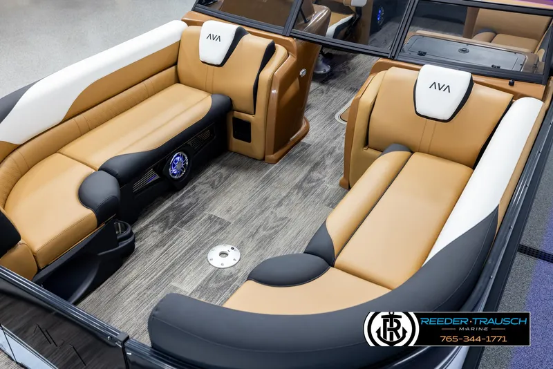 Slide: The Image of 2025 Avalon LSZ EL boat interior with tan and black seating, wood flooring. - 10
