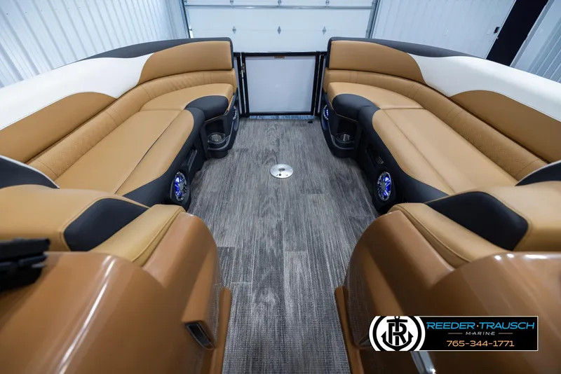 Slide: The Image of Luxurious 2025 Avalon LSZ EL boat interior with tan seating and modern design. - 18