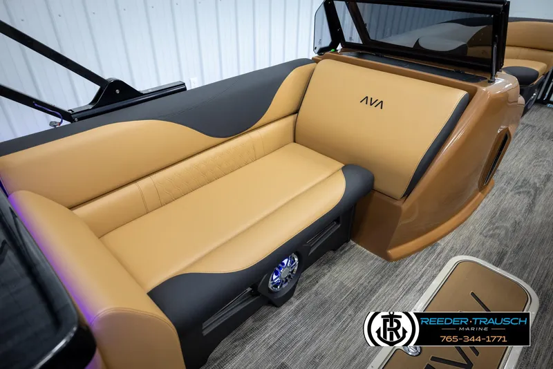 Slide: The Image of 2025 Avalon LSZ EL boat interior with tan and black seating, modern design. - 22
