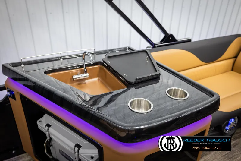 Slide: The Image of Luxurious Avalon LSZ EL 2025 boat interior with sink and cup holders. - 25