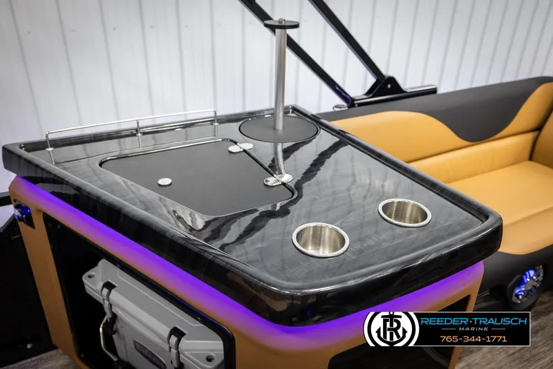 Slide: The Image of Luxurious Avalon LSZ EL 2025 boat interior with sleek bar and seating area. - 26