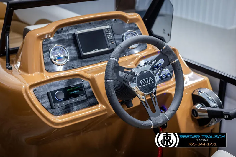 Slide: The Image of 2025 Avalon LSZ EL boat dashboard with modern steering wheel and control panel. - 28