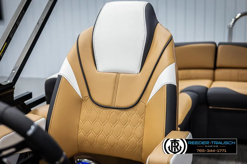 Slide: The Image of 2025 Avalon LSZ EL boat seat with tan and white upholstery, featuring a modern design. - 36