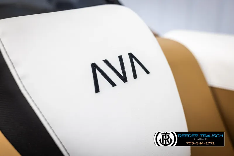 Slide: The Image of Avalon LSZ EL 2025 boat seat with AVA logo, white and tan upholstery. - 38