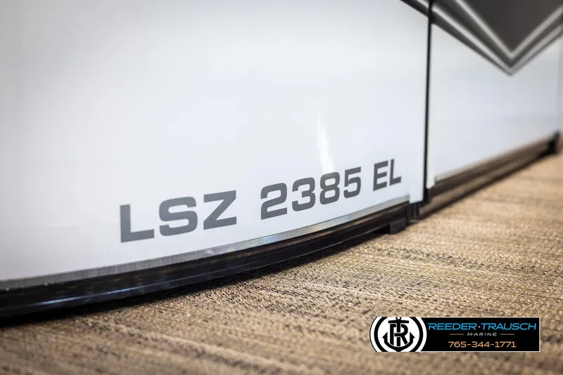 Slide: The Image of 2025 Avalon LSZ EL boat model detail with branding. - 47