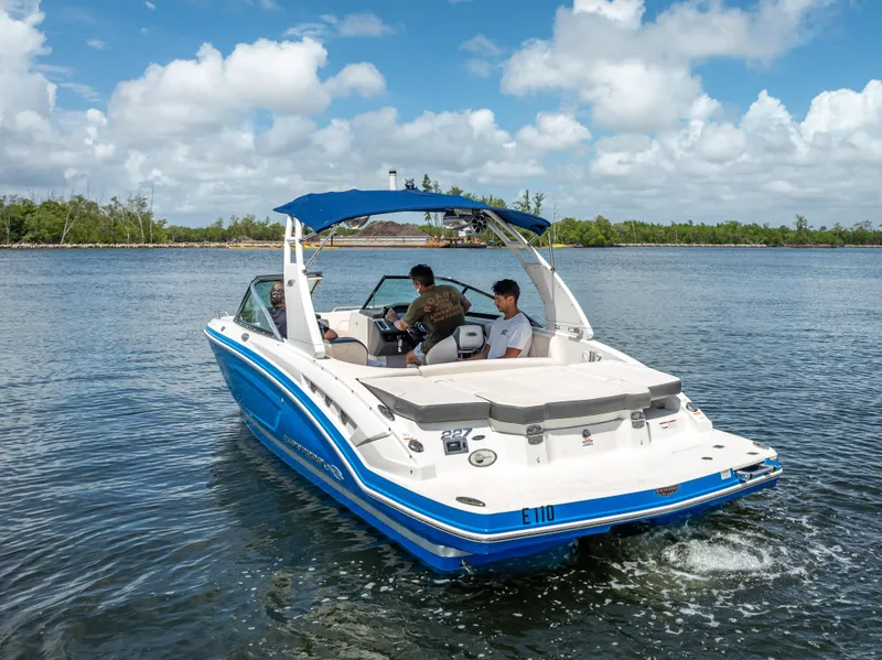 Slide: The Image of 2017 Chaparral 227 SSX boat cruising on a sunny day with passengers onboard. - 13
