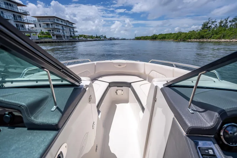 Slide: The Image of 2017 Chaparral 227 SSX boat interior with scenic waterfront view. - 37