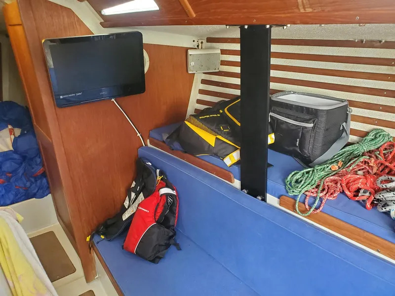 Slide: The Image of Sail stored inside a 2001 Schock 35 boat cabin. - 16
