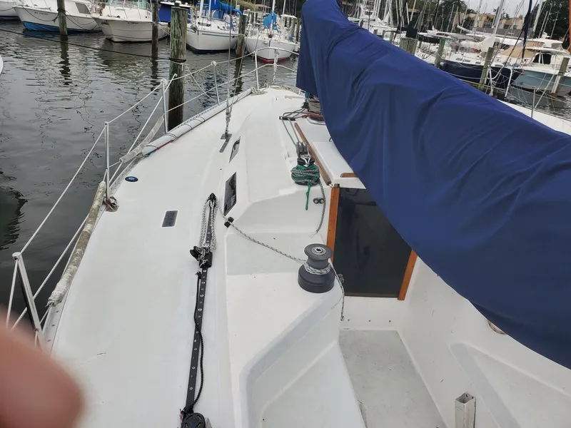 Slide: The Image of Sailboat Schock 35, 2001 model, on stands in a boatyard. - 2