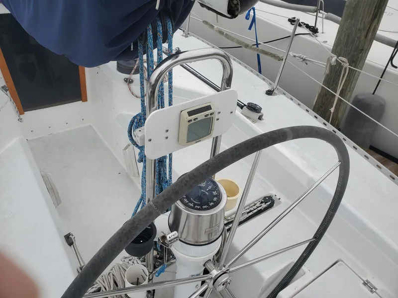 Slide: The Image of Sailboat deck view, Schock 35, 2001 model, docked in a marina. - 4