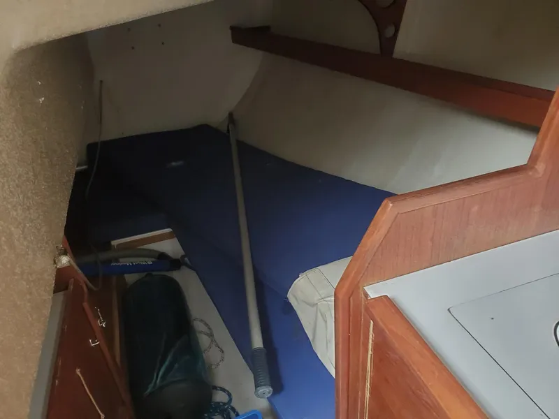 Slide: The Image of 2001 Schock 35 sailboat cockpit with steering wheel and rigging. - 9