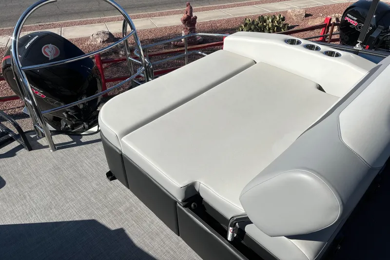 Slide: The Image of 2025 Lowe SS210DHCL boat with spacious sun deck and comfortable seating. - 8