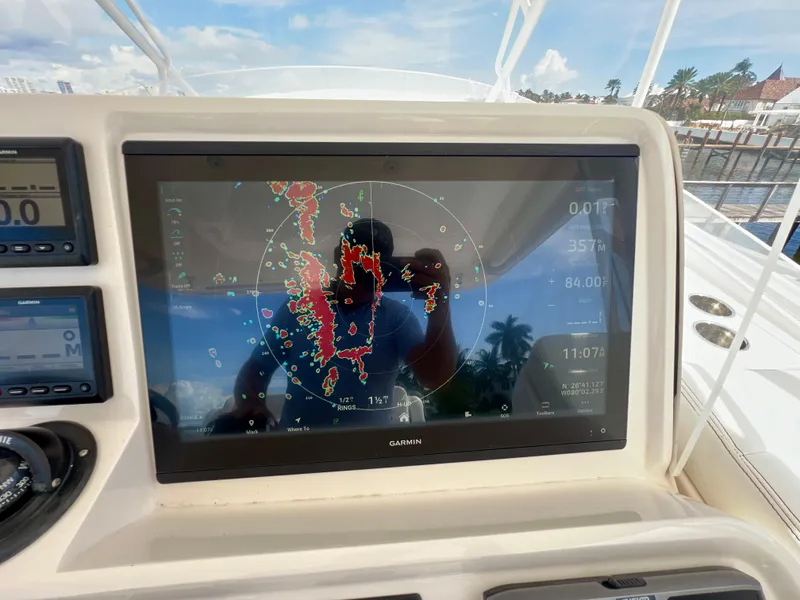 Slide: The Image of Garmin navigation display on 2018 Intrepid 407 Cuddy boat dashboard. - 19