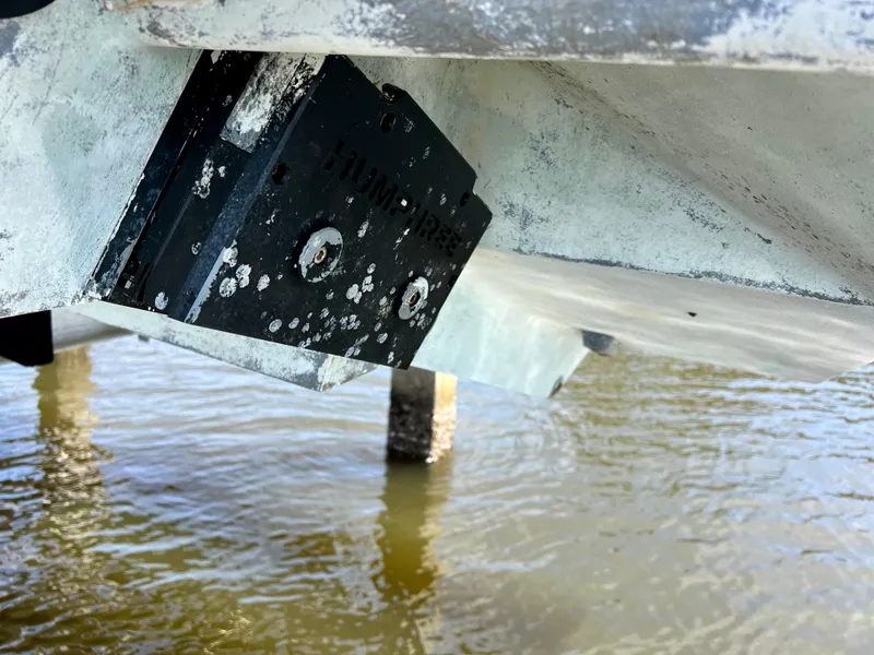 Slide: The Image of Close-up of 2018 Intrepid 407 Cuddy boat hull with marine growth. - 24
