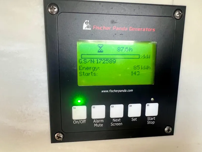 Slide: The Image of Fischer Panda generator display on 2018 Intrepid 407 Cuddy boat, showing usage stats. - 31