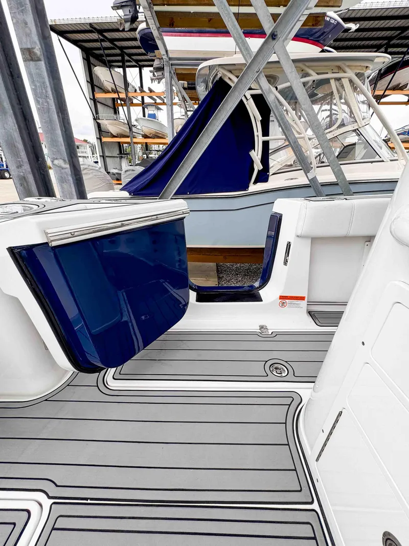 Slide: The Image of 2018 Sportsman Open 312 Center Console boat interior with sleek design and modern features. - 11