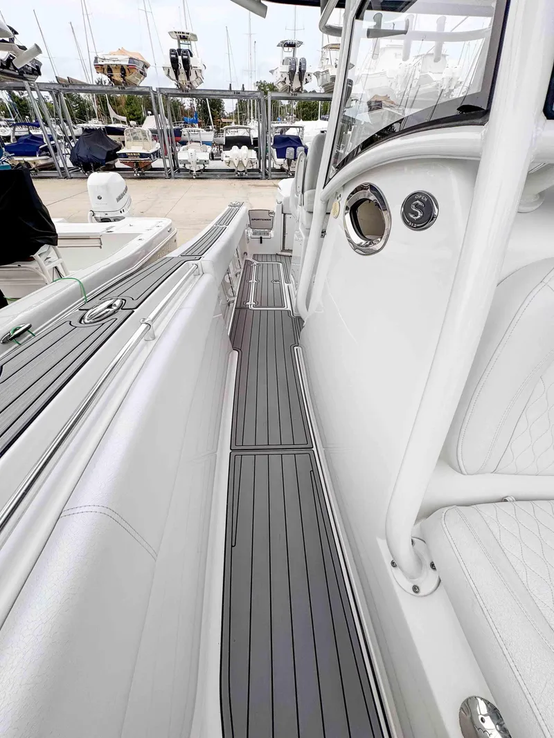 Slide: The Image of 2018 Sportsman Open 312 Center Console boat interior with sleek design and modern features. - 15