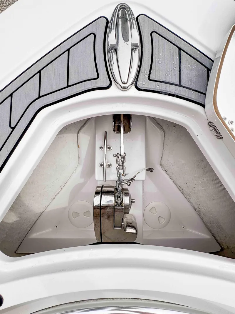 Slide: The Image of 2018 Sportsman Open 312 Center Console boat anchor compartment. - 22